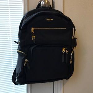 Tumi backpack black and gold